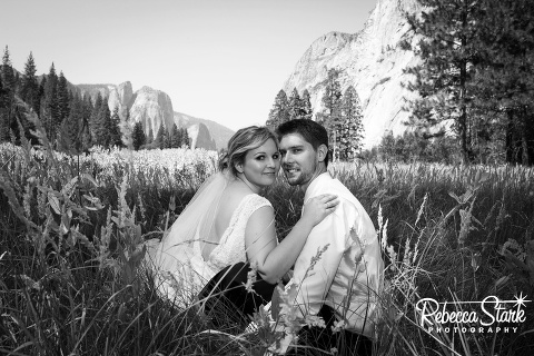 bride and groom in meadow at Yosemite